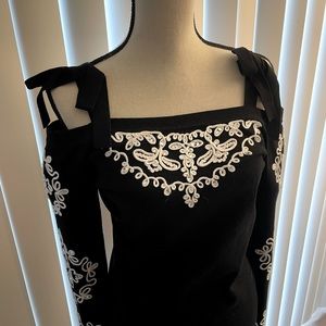 INC dressy sweater.  Black with cream embellished with rhinestone Sz L